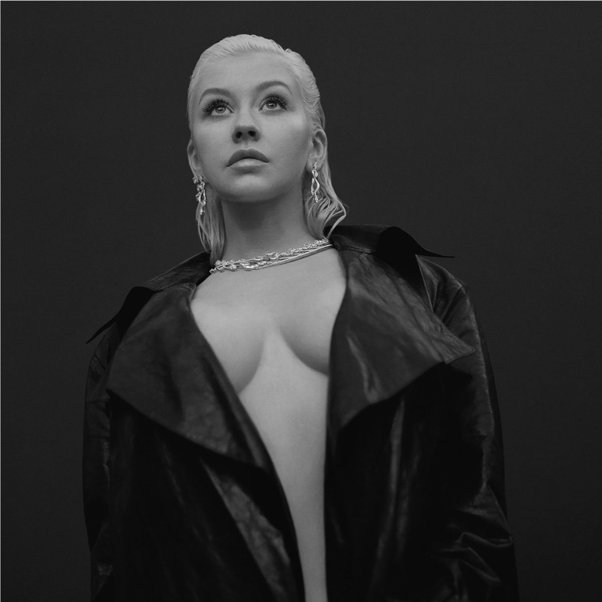 Christina Aguilera: New Photoshoot Sparks Debate Over Excessive Photo Editing Christina Aguilera: New Photoshoot Sparks Debate Over Excessive Photo Editing