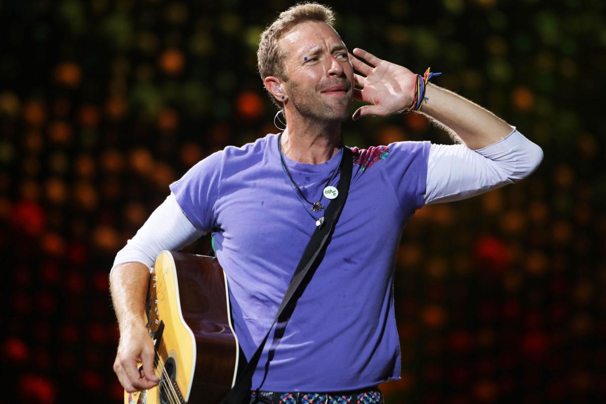 Coldplay Delivers A Message Of Love At Number One Concert: Music And Lights Dazzle Fans Coldplay Delivers A Message Of Love At Number One Concert: Music And Lights Dazzle Fans