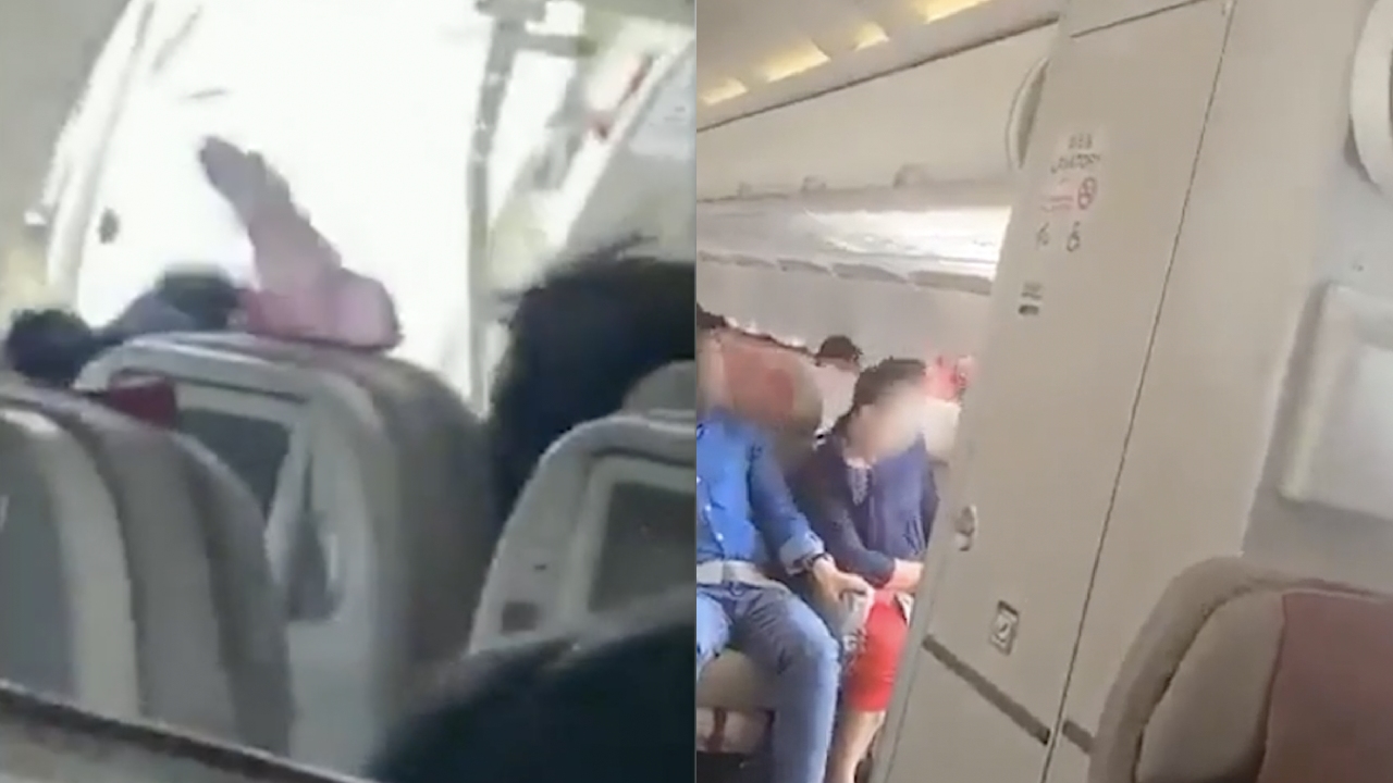 Flight From Tokyo Diverted After Passenger's Attempted Exit Door Opening Flight From Tokyo Diverted After Passenger's Attempted Exit Door Opening