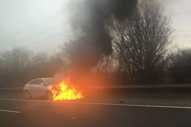 M56 Car Crash: Overturned Vehicle, Casualty Treated On Motorway M56 Car Crash: Overturned Vehicle, Casualty Treated On Motorway