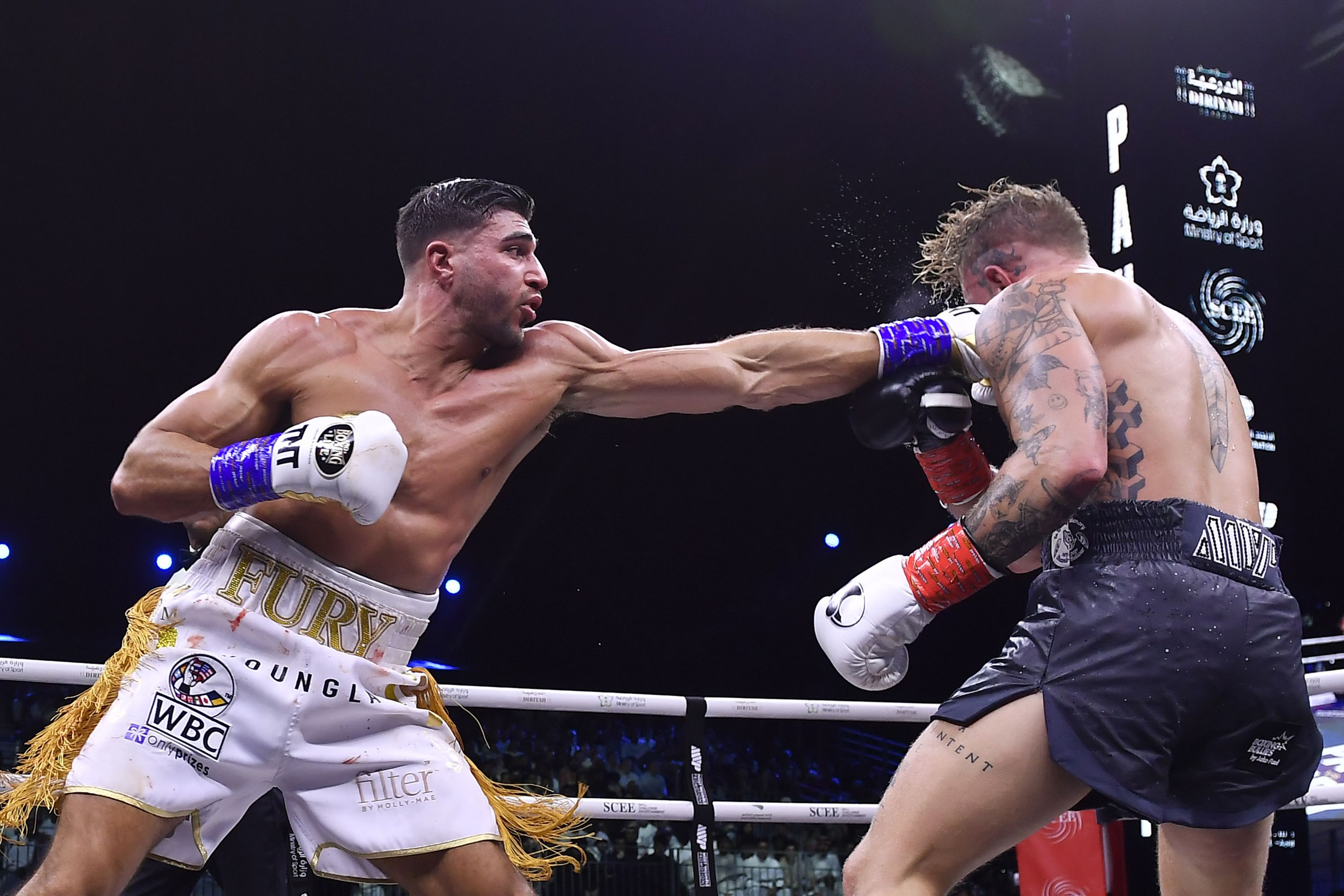 Tommy Fury's Dramatic Stage Appearance: A Tassel Shorts Spectacle. Tommy Fury's Dramatic Stage Appearance: A Tassel Shorts Spectacle.